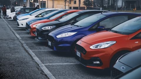 A fleet owner with one of their cars