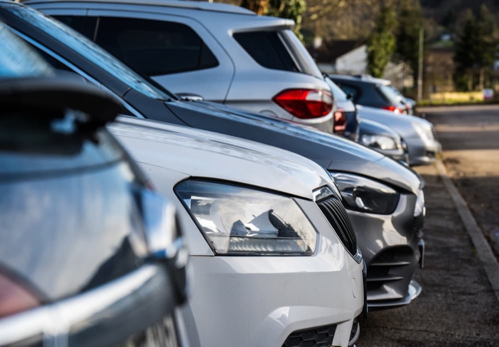 A row of cars parked kerbside