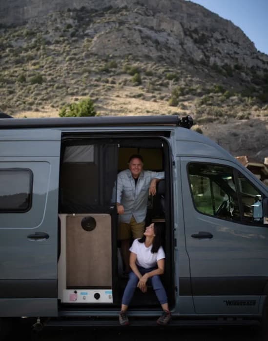 The founding team loading up a camper van